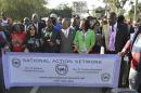 Rev. Al Sharpton marches with mother of Trayvon Martin against Stand Your Ground law in Tallahassee, Florida