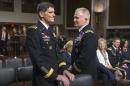 Gen. Joseph L. Votel, currently the head of the Special Operations Command, left, and Lt. Gen. Raymond A. Thomas III, arrive on Capitol Hill in Washington, Wednesday, March 9, 2016, to testify before the Senate Armed Services confirmation Committee hearing to elevate their positions. Votel has been nominated to become the commander of U.S. Central Command which oversees military operations in Iraq and Syria against the Islamic State Group. Thomas has been nominated to replace Gen. Votel as leader of the secretive Special Operations Command. (AP Photo/J. Scott Applewhite)