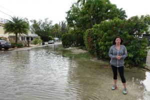 Ashley Eversman stands near the street where she lives&nbsp;&hellip;