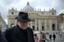 US cardinal Leo Raymond Burke walks through St Peter's Square after a cardinals' meeting at the Vatican, on March 11, 2013