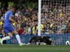 Chelsea's Fernando Torres scores against Norwich City's goalkeeper John Ruddy during their English Premier League soccer match in London