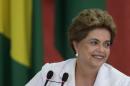 Brazil's President Dilma Rousseff smiles during the launching ceremony of the third stage of Minha Casa Minha Vida Program, at the Planalto Presidential Palace in Brasilia, Brazil, Wednesday, March 30, 2016. Former Brazilian President Luiz Inacio Lula da Silva said Monday that he believes Rousseff, his embattled successor and protege, can survive mounting pressure in Congress for her impeachment. Rousseff recently appointed Silva as her chief of staff in a much-discussed move that still must be confirmed by Brazil's top court. (AP Photo/Eraldo Peres)