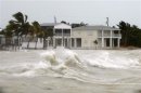 File photo shows strong waves crashing around coastal houses in Key West, Florida