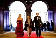 Queen Beatrix of the Netherlands (C) arrives on April 29, 2013 with her son Prince Willem-Alexander (R) and his wife Princess Maxima to attend a dinner at the National Museum in Amsterdam on the eve of her abdication