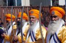 Baptised Sikhs, known as the beloved ones, march in a parade with karpans (swords) April 10, 2004 in Vancouver, Canada