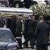 The coffin holding the remains of singer Whitney Houston is carried to a hearse after funeral services at the New Hope Baptist Church in Newark, N.J.,  Saturday, Feb. 18, 2012. Houston died last Saturday at the Beverly Hills Hilton in Beverly Hills, Calif., at the age 48. (AP Photo/Mel Evans)