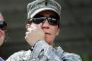 U.S. Army First Lt. Alessandra Kirby wipes away a tear after a Ranger School graduation ceremony, Friday, Aug. 21, 2015, at Fort Benning, Ga. First Lt. Shaye Haver and Capt. Kristen Griest became the first female soldiers to complete the course and receive their Ranger tabs. (AP Photo/John Bazemore)
