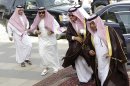Saudi Foreign Minister Prince Saud al-Faisal, second right, seen upon his arrival with his bodyguards to the foreign ministers of the Gulf Cooperation Council 