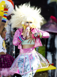 Nicki Minaj reacts following a wardrobe malfunction during a live performance on ABC's Good Morning America in New York, Friday, Aug. 5, 2011. (AP Photo/Charles Sykes)