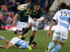 South Africa's Habana breaks past Argentina's Landajo and Amorosino during their rugby union test match in Cape Town