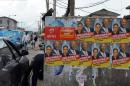 Campaign posters for the Lagos gubernatorial candidate from the opposition People's Democratic Party, Jimi Agbaje, are seen on March 10, 2015 in Lagos