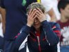 Clijsters of Belgium reacts after her defeat to Robson of Britain in their women's singles match at the U.S. Open tennis tournament in New York