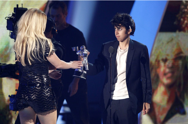 Lady Gaga, right, presents Britney Spears with the Video Vanguard award at the MTV Video Music Awards on Sunday Aug. 28, 2011, in Los Angeles. (AP Photo/Matt Sayles)