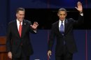 FILE - In this Oct. 3, 2012, file photo, Republican presidential candidate Mitt Romney and President Barack Obama wave to the audience during the first presidential debate at the University of Denver in Denver. The sixth "town hall" style presidential debate will bring Obama and Romney to Hofstra University on New York's Long Island Tuesday, Oct. 16, 2012. They'll take questions from undecided voters selected by Gallup. (AP Photo/Charlie Neibergall, File)