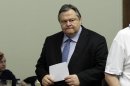 Greek Socialist PASOK party leader Evangelos Venizelos arrives at a press room after a meeting with Democratic Left leader Fotis Kouvelis in the Parliament in Athens, on Tuesday, June 19, 2012. Rival Greek party leaders launched a second day of talks on Tuesday in an attempt to quickly form a pro-bailout coalition government, after the debt-crippled country's second inconclusive election in six weeks. Antonis Samaras' New Democracy party came first in Sunday's vote, winning 129 of Parliament's 300 seats — not enough for him to govern alone. He is seeking an alliance with the third-placed Socialist PASOK and the smaller Democratic Left party. (AP Photo/Kostas Tsironis)