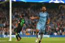 Manchester City's Sergio Aguero celebrates after scoring his sides 3rd goal of the game, and his hat-trick during the Champions League group C soccer match at the Etihad Stadium between Manchester City and Borussia Moenchengladbach in Manchester, England, Wednesday, Sept. 14, 2016. The match was rearranged from Tuesday due to adverse weather conditions in Manchester. (AP Photo/Dave Thompson)