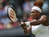 Serena Williams of the United States returns the ball to Mandy Minella of Luxembourg during their Women's first round singles match at the All England Lawn Tennis Championships in Wimbledon, London, Tuesday, June 25, 2013. (AP Photo/Sang Tan)