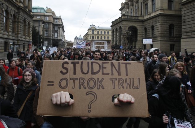 A protester displays sign during demonstration by university students opposing government&#39;s planned education reforms in Prague
