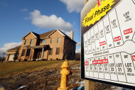 <p>               This Jan. 18, 2012 photo shows a new home in a development in Pleasant Hills, Pa. Fewer people bought new homes in December, making 2011 the worst sales year on record. (AP Photo/Gene J. Puskar)