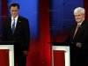 Republican presidential candidates, former Massachusetts Gov. Mitt Romney, left, stands next to former House Speaker Newt Gingrich before a Republican Presidential debate Monday Jan. 23, 2012, at the University of South Florida in Tampa, Fla. (AP Photo/Paul Sancya)