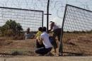 Civilians try to enter Turkey illegally at the Bab Al-Salam border crossing