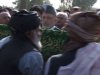Afghan president buries assassinated brother.
