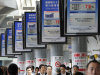 People walk through a train station concourse in Tokyo Friday, Sept. 9, 2011. Japan's economy contracted the April-June quarter at an annual rate of 2.1 percent, worse than the initial estimate, the government said Friday, underlining the damage from the March earthquake disaster. (AP Photo/Koji Sasahara)