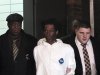 Jerome Isaac, center, is led out of the 77th Precinct in the Brooklyn borough of New York, Sunday, Dec. 18, 2011, following his arrest in the death of a woman set afire in an elevator. Isaac told police he set 73-year-old Deloris Gillespie on fire because he was angry that she owed him $2,000, authorities said Sunday. (AP Photo/Robert Mecea)