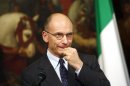 Italian PM Letta gestures during a news conference with European Parliament President Schulz at Chigi palace in Rome