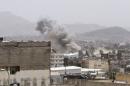 Dust rises from the site of a Saudi-led air strike in Yemen's capital Sanaa