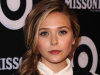 In this Sept. 7, 2011 photo, Elizabeth Olsen attends the Missoni For Target event, celebrating the Missoni for Target pop up store, in New York.  Target drummed up so much buzz for its exclusive, limited-time line by high-end Italian designer Missoni that its web site was down for most of the day last Tuesday when the collection was launched, which angered some customers. Now, more than a week later, some shoppers who bought the Missoni By Target line of clothes, housewares and other doodads are saying they’ll never shop at the retailer again after finding out their online orders have been delayed _ or worse, canceled.   (AP Photo/Peter Kramer)