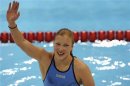 Lithuania's Ruta Meilutyte reacts after winning the women's 100m breaststroke final during the London 2012 Olympic Games at the Aquatics Centre
