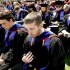 Liberty University students pray during a commencement ceremony. (Jill Nance/AP)