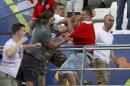 Clashes break out in the stands during the Euro 2016 Group B soccer match between England and Russia, at the Velodrome stadium in Marseille, France, Saturday, June 11, 2016. (AP Photo/Thanassis Stavrakis)