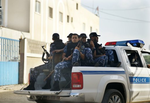 Hamas policemen guard outside a Gaza military court