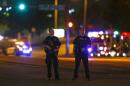 Police officers block an intersection after a shooting outside the Muhammad Art Exhibit and Contest in Garland, Texas