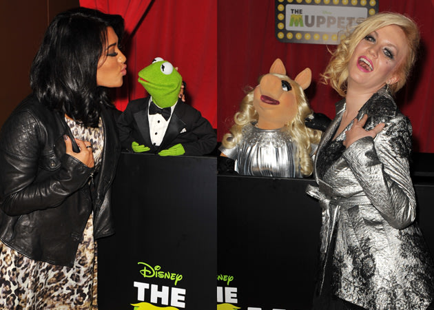 Kermit cuddled up to Vanessa White while Miss Piggy giggled with Kitty 