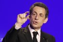France's President and candidate for re-election in 2012, Nicolas Sarkozy, gestures as he delivers a speech during a meeting in Ormes, France, Monday, March 26, 2012. (AP Photo/Michel Euler)