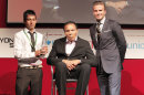 This Tuesday July 24, 2012 photo provided by Beyond Sport, shows boxing legend Muhammad Ali, center, with soccer player David Beckham, right, presenting a community service award to Matiullah Haidar at the Beyond Sport Summit in London. Only London Olympics Opening Ceremony director Danny Boyle and a few well-informed others will know for certain if British newspapers are wrong with their speculation that Ali could play a role on Friday night when the ceremony is held. (AP Photo/Action Images for Beyond Sport)