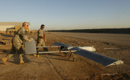 File photo shows US soldiers preparing to launch a Shadow drone in Iraq. Iraqi officials have expressed outrage at the United States' use of a small fleet of surveillance drones to help protect the US embassy, consulates and American personnel in Iraq, The New York Times reported. (AFP Photo/Patrick Baz)