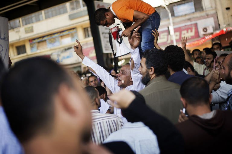 Supporters of Morsi demonstrate against the ouster of the former leader on the outskirts of Cairo, on August 23, 2013