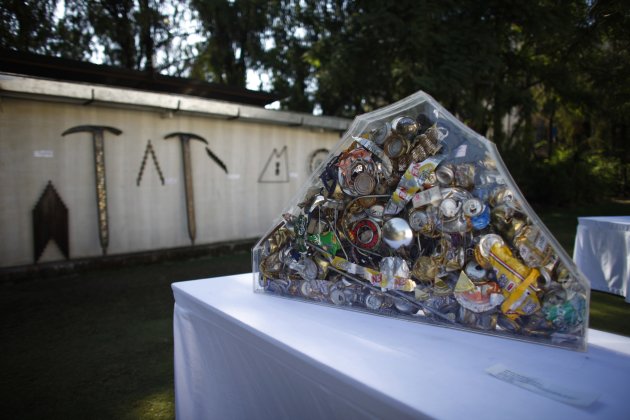 Art made from trash picked from Mount Everest are pictured at a visual art symposium in Kathmandu November 20, 2012. Fifteen Nepali artists closeted for a month with a heap of 1.5 metric tons (1.7 tons) of trash picked up from Mount Everest transformed the litter into art, creating 75 sculptures, including one of a yak and another of wind chimes, made from empty oxygen bottles, gas canisters, food cans, torn tents, ropes, crampons, boots, plates, twisted aluminium ladders and torn plastic bags dumped by climbers over decades on the slopes of the world's highest mountain. Kripa Rana Shahi, director of art group Da Mind Tree, said the sculpting - and a resulting recent exhibition in the Nepali capital of Kathmandu - was aimed at spreading awareness about keeping Mount Everest clean. Picture taken November 20, 2012. REUTERS/Stringer (NEPALSOCIETY ENVIRONMENT - Tags: ENVIRONMENT SOCIETY)