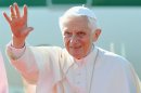 Pope Benedict XVI arrived to ringing church bells and cheering crowds at Guanajuato International Airport