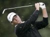 John Mallinger hits approach shot during final round at Pebble Beach