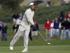 Tiger Woods watches his second shot on the 17th hole during the third round of the 2012 U.S. Open golf tournament on the Lake Course at the Olympic Club in San Francisco