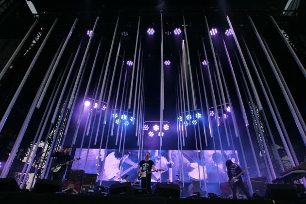 FILE -- In an Aug. 1, 2008 file photo Thom Yorke, center, performs with Radiohead at Lollapalooza in Chicago's Grant Park. The Black Keys, Radiohead, Dr. Dre and Snoop Dogg will headline two weekends of concerts at The Coachella Valley Music and Arts Festival organizers announced Monday Jan. 9, 2012. (AP Photo/Russel A. Daniels/file)