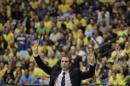 FILE - In this April 21, 2014, file photo, then-Maccabi Tel Aviv's head coach David Blatt gestures during a EuroLeague Basketball Group D playoff basketball game against Emporio Armani Milan in Tel Aviv, Israel. Blatt's transition in the NBA has been tough: The team is floating around the .500 mark despite a star-studded roster and he looks to be on the hot seat already because of some lengthy losing streaks and what looks to be a strained relationship with star LeBron James. But back in Israel, he remains one of the country's most beloved figures, thanks to his illustrious history in his adopted homeland and a nationwide pride in his making it big time. (AP Photo/Ariel Schalit, File)