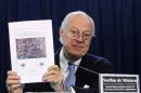 U.N. special representative in Afghanistan De Mistura holds a report during a news conference in Kabul
