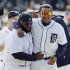 Detroit Tigers' Prince Fielder, left, and Miguel Cabrera walk off the field after their 3-2 win over the Boston Red Sox in a baseball game in Detroit, Thursday, April 5, 2012. (AP Photo/Carlos Osorio)