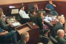 In this image taken from Colorado Judicial Department video, Colorado theater shooter James Holmes, top second from left in light-colored shirt, sits in court during the penalty phase of his trial, Monday, July 27, 2015, in Centennial, Colo. Dr. Jeffrey Metzner, the court-appointed psychiatrist who concluded that Holmes was legally sane when he attacked a Colorado movie theater, says Holmes' mental illness still is what caused him to kill 12 people and injure 70 others. (Colorado Judicial Department via AP, Pool)